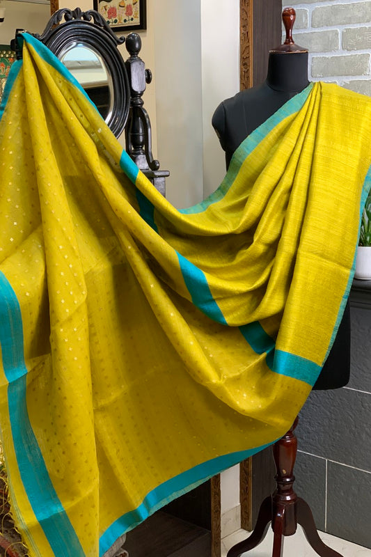 Yellow- greenish pure matka silk saree with contrast firozi border and sequins pallu