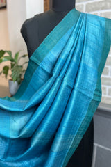 Pure Tussar silk firozi ( Chintamani) saree with green border and magenta pallu
