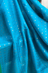 Pure matka silk Firozi Blue saree with green border