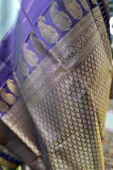 Pearl white Zari checkered pure silk Narayanpet Saree with deep purple border and pallu.