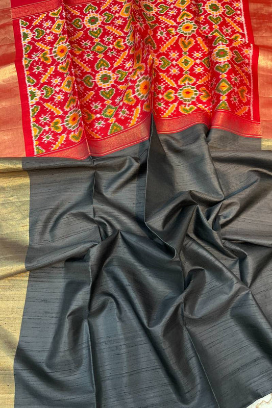 Jet Black Pure Raw Silk Saree with woven Red Ikkat Pallu and Blouse