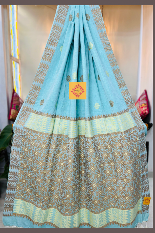 Handwoven Sky Blue coloured Assam cotton saree with beige tribal work