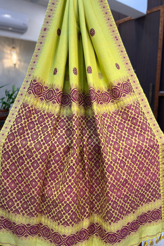 Lemon Yellow Handwoven Assamese Khadi cotton Saree with pink work on pallu