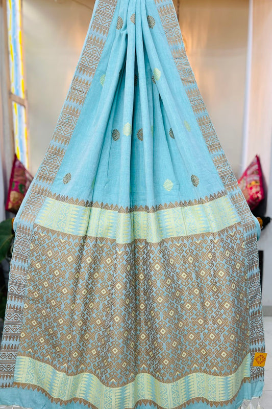 Handwoven Sky Blue coloured Assam cotton saree with beige tribal work