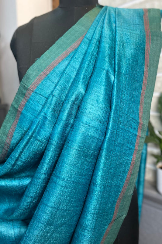 Pure Tussar Silk Ketia Chintamani / firozi saree with Pink Pallu.