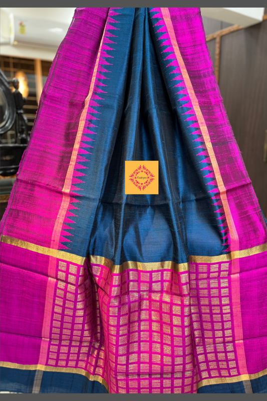 A beautiful German Blue Pure Raw Silk Saree with Magenta Border