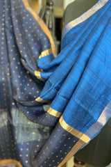 German Blue coloured Pure Matka silk saree with golden zari border and sequins pallu