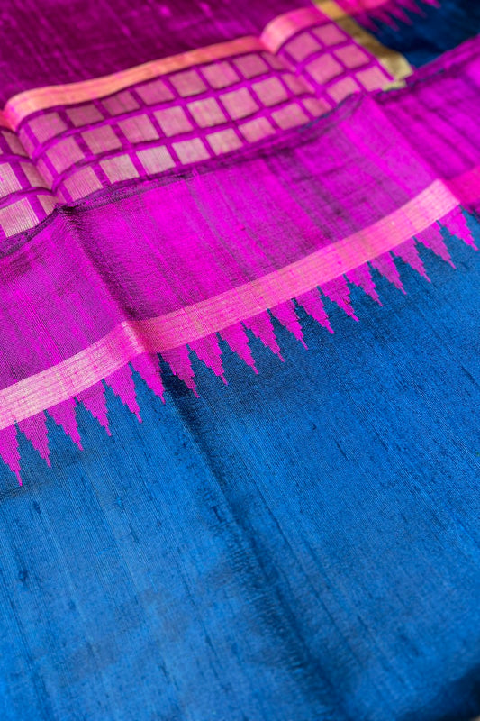 A beautiful German Blue Pure Raw Silk Saree with Magenta Border