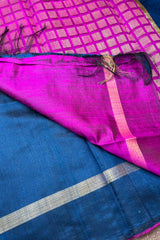 A beautiful German Blue Pure Raw Silk Saree with Magenta Border