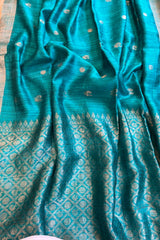 Pure Matka silk, Handwoven firozi ( chintamani) coloured saree with Meenakari golden buttis and pallu