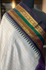 Pearl white Zari checkered pure silk Narayanpet Saree with deep purple border and pallu.