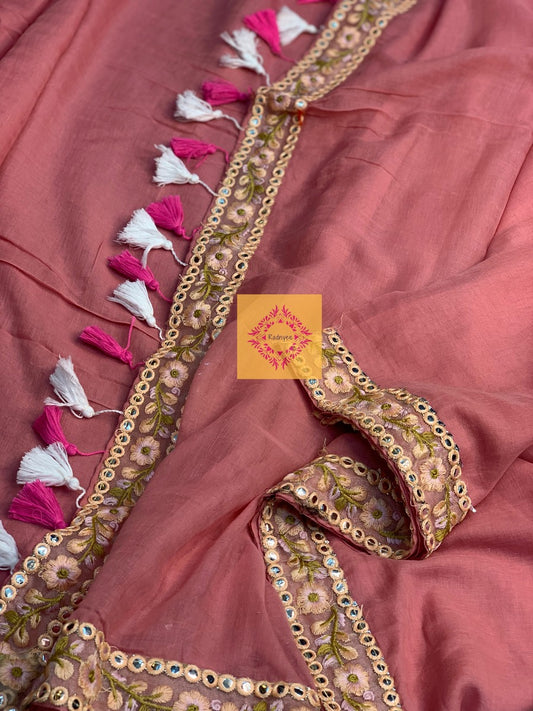 Rose Pink Mulmul Saree with golden lace and contrast tassels